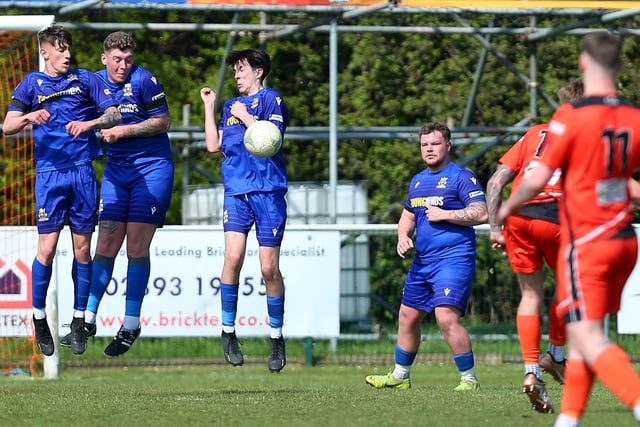 Baffins defend against a Portchester free-kick. Picture: Chris Moorhouse