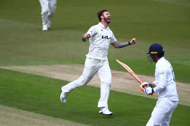 Jordan Clark celebrates dismissing Kyle Abbott as Hampshire collapsed at the Kia Oval. Photo by Jordan Mansfield/Getty Images for Surrey CCC.