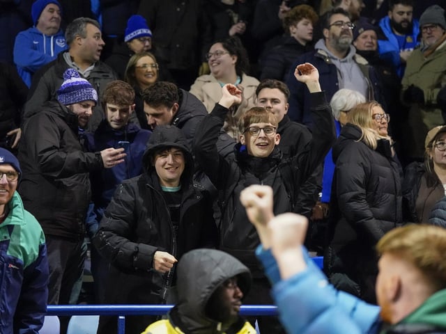 Pompey fans backed their team to a crucial Championship survival win over Cardiff last night.