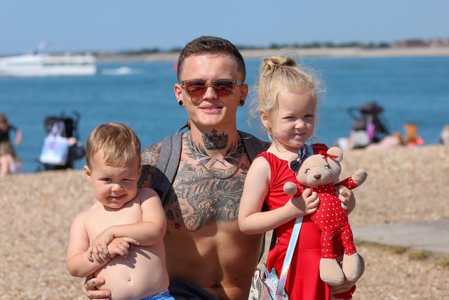 Rhys Barber with son Romeo Barber (two) and daughter Legacy Barber (five). Picture: Alex Shute