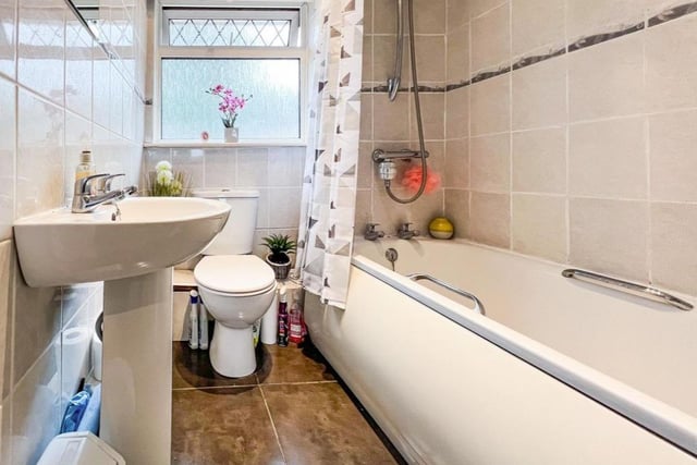 This two bedroom house in Cosham has a spacious bathroom which has a shower over bath.
