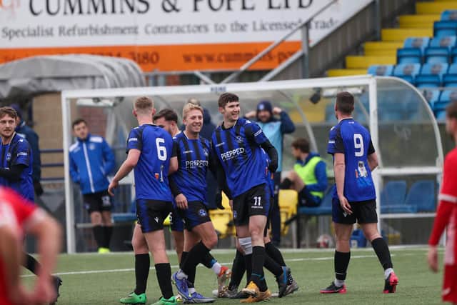 Clanfield celebrate a goal against Colden Common. Picture: Alex Shute