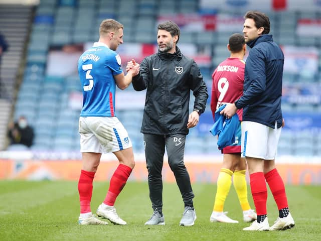 Triumphant head coach Danny Cowley celebrates a debut victory over Ipswich with left-back Lee Brown. Picture: Joe Pepler