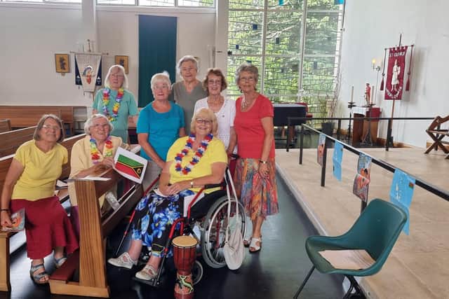 World Day of Prayer at St George's Church. Ruth Loveman and Rosina Clark, seated. From left to right standing: Pat Knowles, Dorothy Pople, Margaret Symonds, Norma Gibney, and Elizabeth White. In front is Mandy Masson.