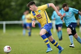 Bayley Whitcombe, in action for Meon Milton (yellow) last season, scored his first Clanfield goal in a 4-4 draw against Liphook. Picture: Chris Moorhouse