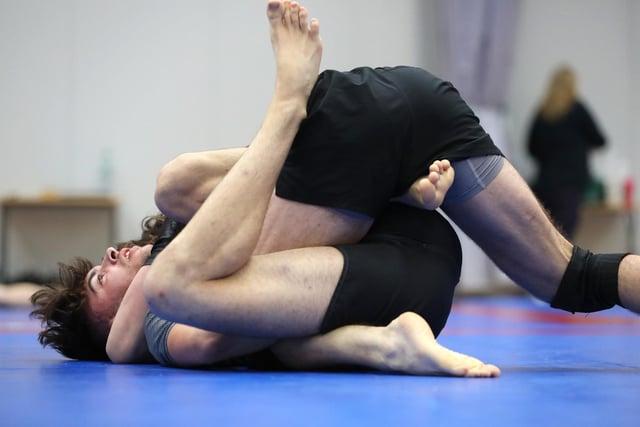Bradley Fry, top, competing in a Brazilian Jiu Jitsu competition at the Ravelin Centre in Portsmouth. Picture: Chris Moorhouse (jpns 250223-04)
