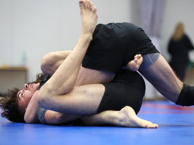 Bradley Fry, top, competing in a Brazilian Jiu Jitsu competition at the Ravelin Centre in Portsmouth. Picture: Chris Moorhouse (jpns 250223-04)