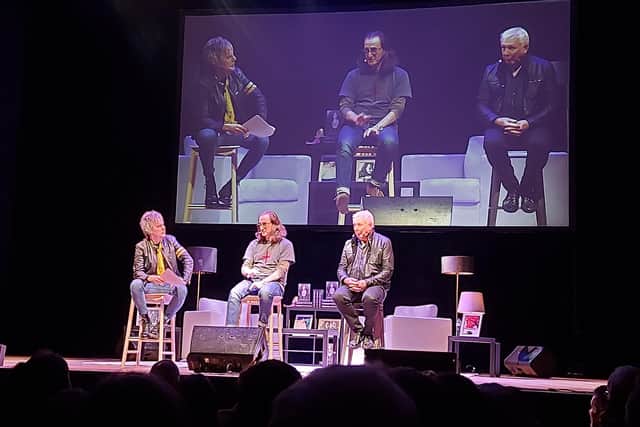 The Q&A section of Geddy Lee: My Effin' Life in Conversation at Portsmouth Guildhall on December 17, 2023. 
From left: Music journalist Phil Wilding, Geddy Lee, Alex Lifeson