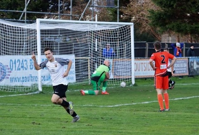 Evan Harris celebrates scoring Pagham's first half leveller. Picture by Roger Smith