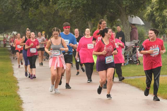 Pictured is: Plodding on in the rain.Picture: Keith Woodland (070719-471)