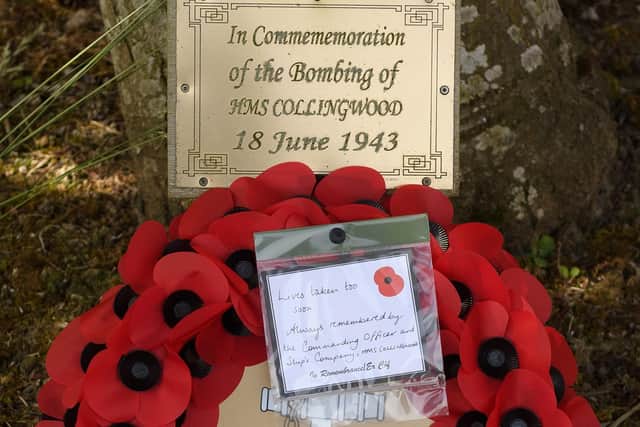The wreath laid at the site of the bombing on HMS Collingwood.