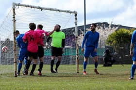 Harry Leigh, third from left, heads home for Freehouse Reserves against Old Boys Athletic at Havant Academy. Picture: Chris Moorhouse