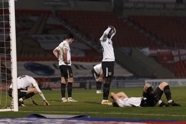 Portsmouth players look dejected after the Sky Bet League One match between Doncaster Rovers and Portsmouth at Keepmoat Stadium on March 2nd 2021 in Doncaster, England. (Photo by Daniel Chesterton/phcimages.com)