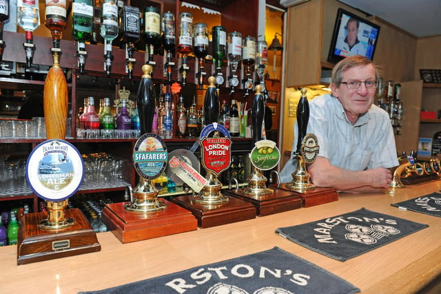 Manager Peter Watson next to some of the real ales the pub had on offer in 2012 (120082-2246)