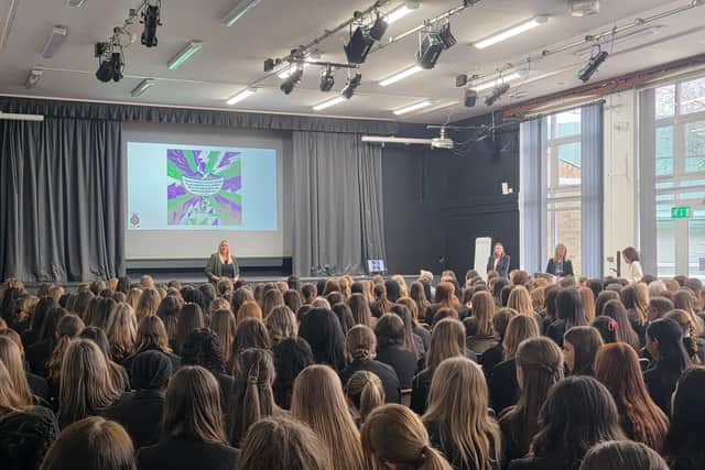 Maria Nicholls, Associate Assistant Headteacher and the event organiser gives the outline of the day to 300 girls at King's Academy Brune Park.