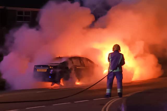 A car on fire in Manor Road, Hayling Island