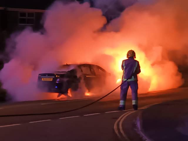 A car on fire in Manor Road, Hayling Island