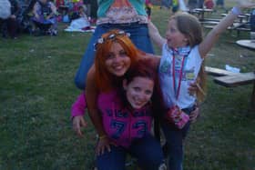 Porsche McGregor-Sims (middle) with mum Fiona Hawke (top), and sisters Tempest (bottom) and Pippin (right) at Camp Bestival
