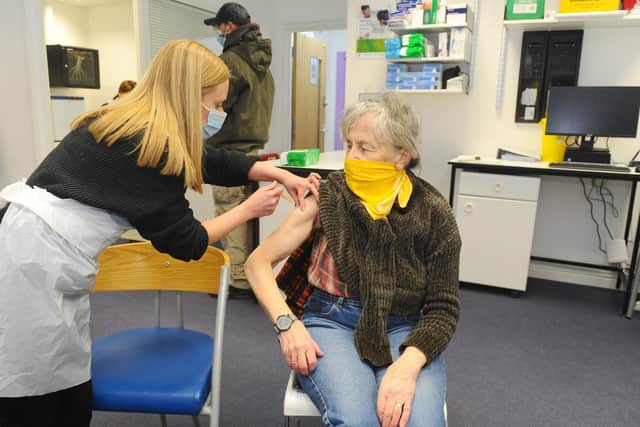 Lalys Pharmacy in Guildhall Walk, Portsmouth, Covid-19 vaccination centre.

Pictured is: Theresa Hawkins from Gosport, having her Covid-19 vaccination.

Picture: Sarah Standing (110221-2822)