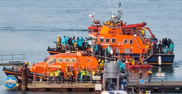 Migrants arriving in Portsmouth on Sunday evening