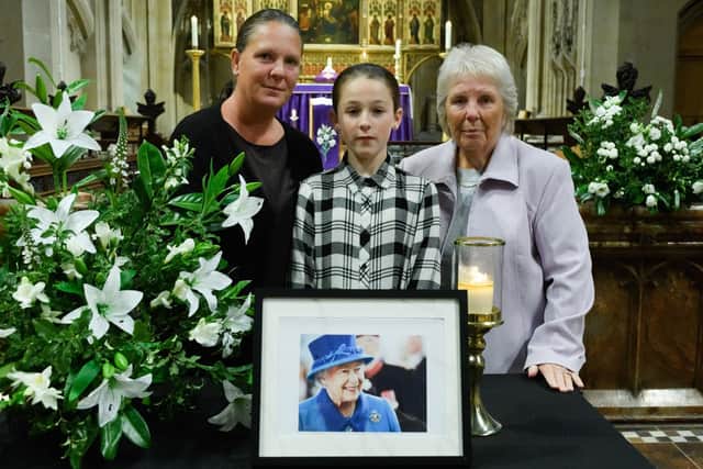 Julie Tipler, her daughter Hollie, and Julie's mother Noreen Stoat at St Mary's Church for a special service dedicated to Queen Elizabeth II.
Picture: Keith Woodland (170921-68)