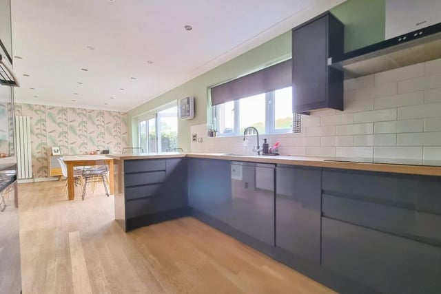 The listing says: "A four-bedroom detached family home which is situated in a popular, elevated location yet within easy access of local shopping amenities, bus routes, commutable road links and in the catchment area for both Court Lane and Springfield School."