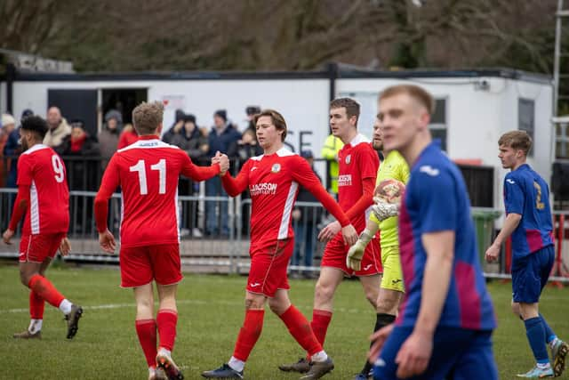 Horndean's Tommy Scutt has just scored against US Portsmouth. Picture by Alex Shute