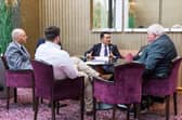 Alan Mak MP talks to Northern Ireland veterans during a visit to Belfast