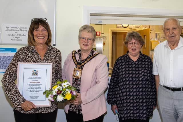 Ronald Brown organised an award to be presented by the mayor of Havant to Liz Wood, manager of Age Concern Cowplain for her service during lockdown. From left: Liz Wood, cllr Rosy Raines, Frances Kilby, vice chairman at Age Concern, and Ronald Brown.
 Photo by Alex Shute