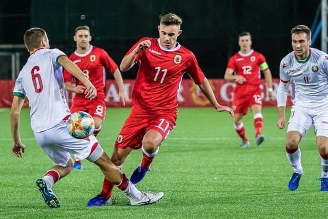 Jack Breed (red) in action for Gibraltar under-21. Pic: Neil Wilson