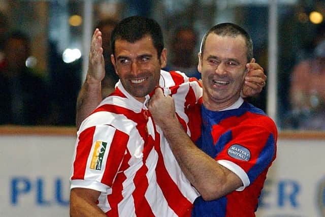 Gavin Maguire and Franny Benali at the end of a bruising encounter at Southern Masters' 5-a-side tournament in Milton Keynes in 2003. Picture: Mick Young