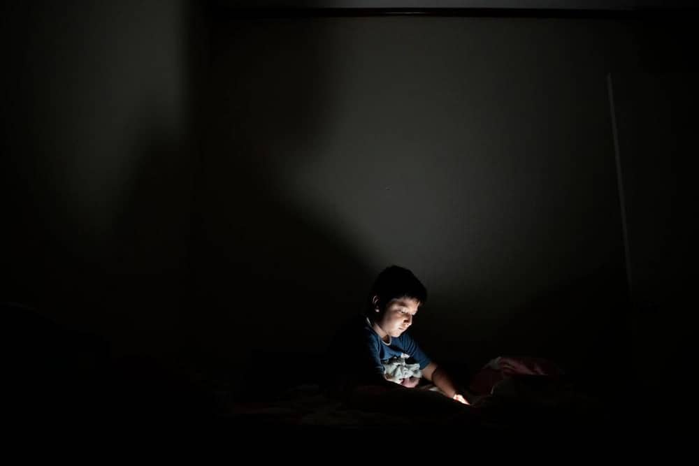 Child on a smartphone. (Photo: MARVIN RECINOS/AFP via Getty Images)