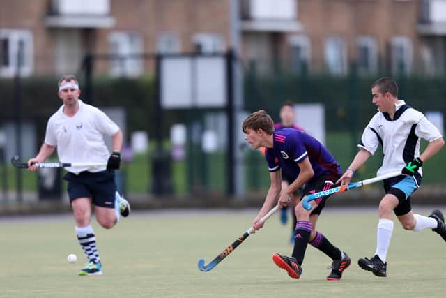 Caleb Rowlands, second right, in action for Portsmouth 2nds against Isle of Wight at Furze Lane. Picture: Chris Moorhouse