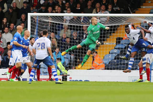 Phil Smith in action against Bury in October 2013 for what would prove to be his final Pompey outing. Picture: Joe Pepler