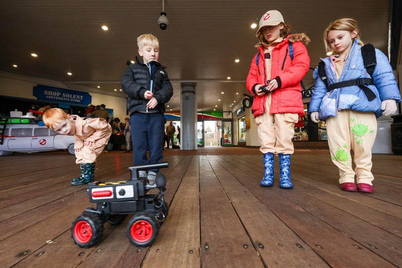 From left, Oliver Tipple, 3, Hudson Lawrence, 5, Arthur Curtis, 7, and Florence Curtis, 5, with a remote control Ghost trap. Cosplay enthusiasts Portsmouth Ghostbusters at Port Solent, Portsmouth, fundraising for Cancer Research UK
Picture: Chris Moorhouse