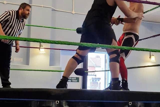 Michael Omega whips Ash Slade