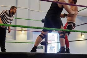 Michael Omega whips Ash Slade