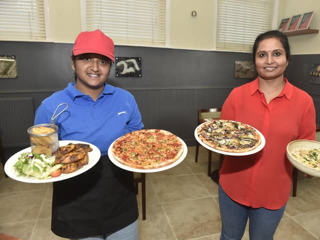 Restaurant 27 in Burgoyne Road, Southsea, has reopened under new ownership which is now serving Italian food. 

Pictured is: (l-r) Waitress Preethi Venkadachalam and owner Tharaka Madanlal.

Picture: Sarah Standing (031224-6972)