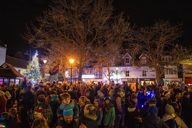 Crowds gathered in Emsworth Square to watch Santa Clause turn on the Christmas lights and hear local children sing festive songs on Friday, November 29.  Photos by Alex Shute