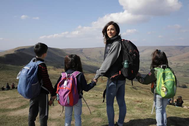 Julia Bradbury with her children at Mam Tor in the Peak District.