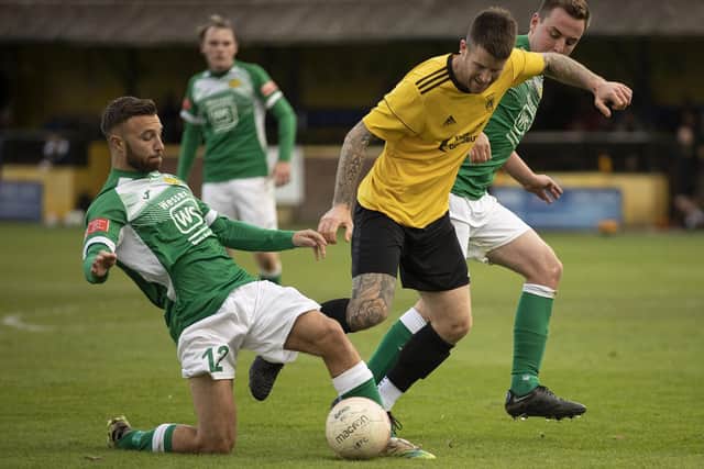 Josh Hazell, left, was on target as Moneyfields crashed out of the FA Vase at lower division Whitchurch. Picture by Chris Hatton.