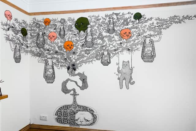 Vik Demjanova, 18 from Southsea, has been creating intricate murals on blank walls. Pictured: Vik's mural in John Kelly's house. Photo by Steve Hughes Photography