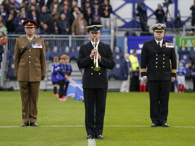 41 moving Portsmouth Remembrance Day images with fan and Charlton Athletic drama as faithful returned to Fratton.
