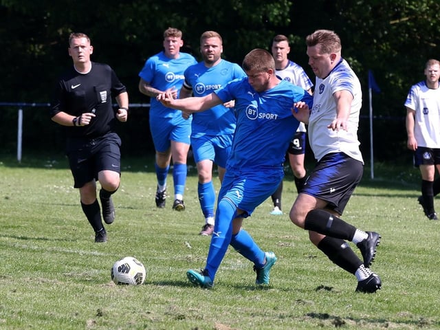 Paulsgrove (blue) v Clanfield. Picture: Sam Stephenson.