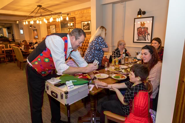 Magician Roy 'Magic Charlie' Charles provides entertainment during the opening of the Brewers Fayre. Picture: Mike Cooter (040323)