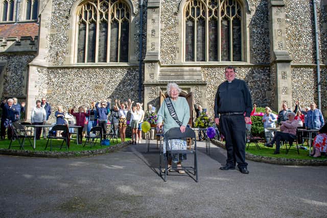 Rita Fergusson with Canon Bob White and friends outside St Mary's Church, Portsmouth. Picture: Habibur Rahman