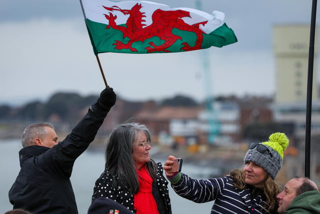 From left, Mark and Julie Benton from Wales, and Jo and Chris Carter from Devon. HMS Prince of Wales returns to HMNB Portsmouth. Picture: Chris  Moorhouse (260324-15)