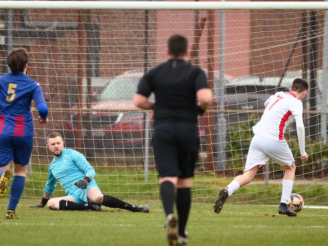 Tommy Tierney about to score his second goal and Horndean's third. Picture: Keith Woodland