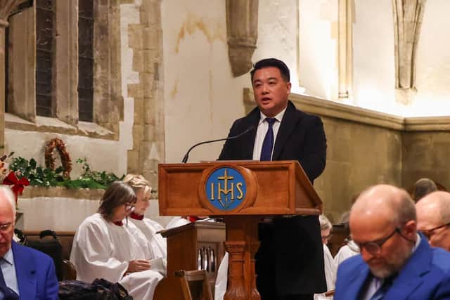 Alan Mak MP gives a reading at the Christmas Carol Service at St Faith's Church, Havant
