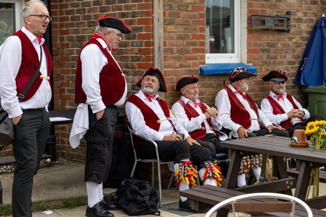 Members of Victory Morris from Portsmouth at the event on Hayling Island. Picture: Mike Cooter (250824)